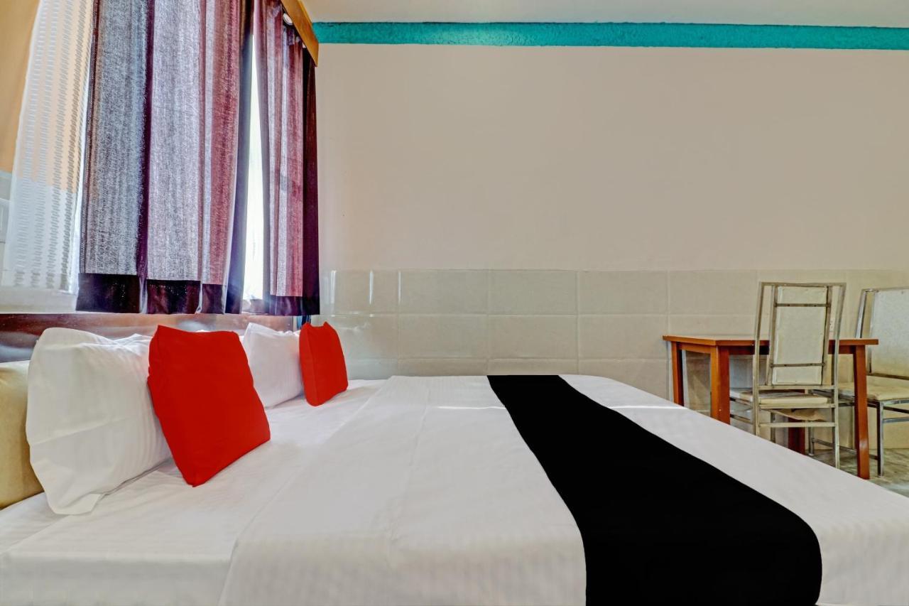 Capital O Kanha Resort Sikandra Rao Bagian luar foto